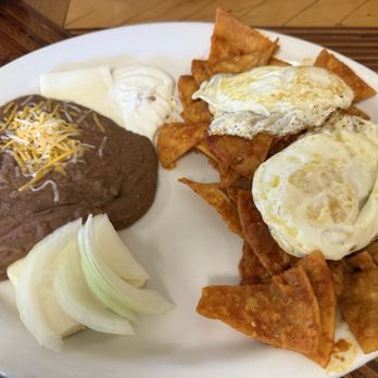 Juanita's Kitchen - Spicy Chilaquiles and I added an extra egg.  Delicious! - Mexican Near Me - Pascagoula, Mississippi