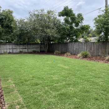 Pride Landscaping - the back yard of a home - Landscaping Near Me - Aloma, Florida Pride Landscaping - the back yard of a home - Landscaping Near Me - Aloma, Florida