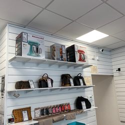 Centreville Gold & Pawn - Designer bags and kitchen appliances