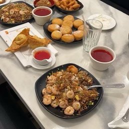 Sweet and sour chicken. Shrimp fried rice, crab Rangoon fried biscuits Sweet and sour chicken. Shrimp fried rice, crab Rangoon fried biscuits