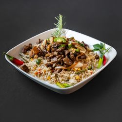 Ghion Ethiopian Restaurant - LambwithRice 
- Tender pieces of lamb sautéed with onions, garlic, rosemary, and jalapeños served with rice