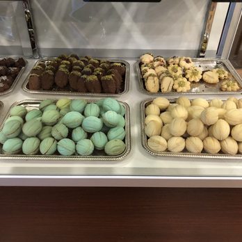 Pistachio - Oh wow! The green ones in front have chocolate inside. I'd get those again. The ones on the right in front have caramel inside. - Chocolatiers & Shops Near Me - Plano, Texas Pistachio - Oh wow! The green ones in front have chocolate inside. I'd get those again. The ones on the right in front have caramel inside. - Chocolatiers & Shops Near Me - Plano, Texas
