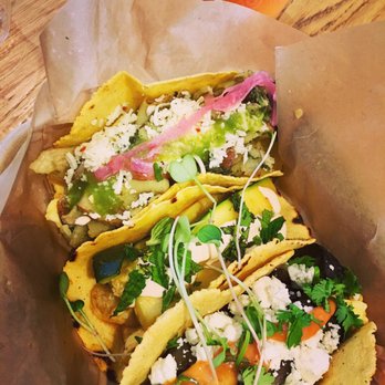 Chaia - Trio of tacos from top: creamed kale & potato, zucchini, and mushroom. - Vegetarian Near Me - Washington, DC, District of Columbia Chaia - Trio of tacos from top: creamed kale & potato, zucchini, and mushroom. - Vegetarian Near Me - Washington, DC, District of Columbia