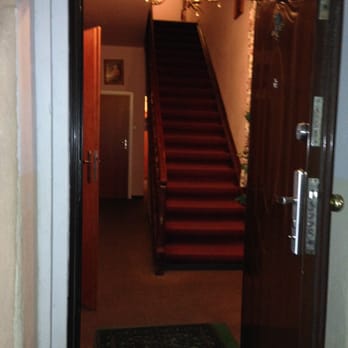 Aparthotel Astor - 2015_0710-2015_0710-"main" corridor/stairs; looking inside from door to exterior covered entry drive - Hotels Near Me - Kraków, Massachusetts