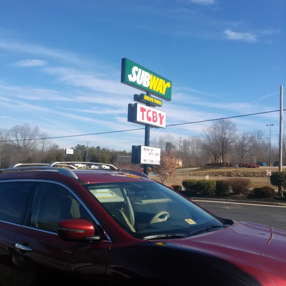 Subway - a red car parked in front of a subway sign - Sandwiches Near Me - Chatham, Virginia Subway - a red car parked in front of a subway sign - Sandwiches Near Me - Chatham, Virginia