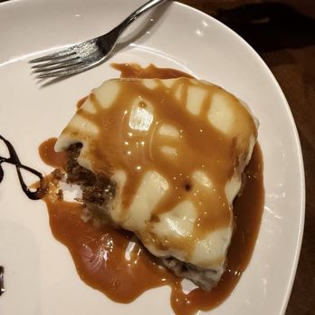 Firebirds Wood Fired Grill - Warm Carrot Cake with Salted Caramel sauce - Seafood Near Me - Gainesville, Virginia Firebirds Wood Fired Grill - Warm Carrot Cake with Salted Caramel sauce - Seafood Near Me - Gainesville, Virginia