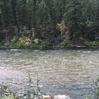Campfire Lodge Resort - Madison River runs just below the cafe and some of the campgrounds - Hotels Near Me - West Yellowstone, Montana Campfire Lodge Resort - Madison River runs just below the cafe and some of the campgrounds - Hotels Near Me - West Yellowstone, Montana