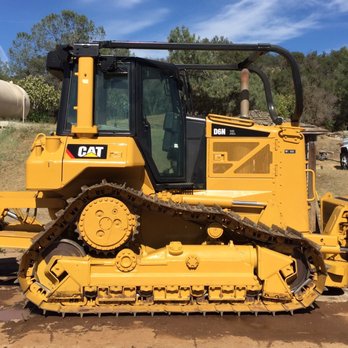 Wallis Excavating - the front end of a bulldozer - General Contractors Near Me