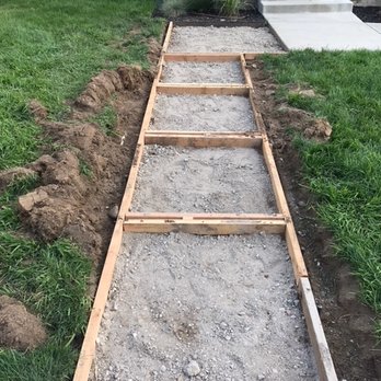 Martinez Concrete SpeciaIist - a concrete walkway being built in front of a house - Flooring Near Me Martinez Concrete SpeciaIist - a concrete walkway being built in front of a house - Flooring Near Me