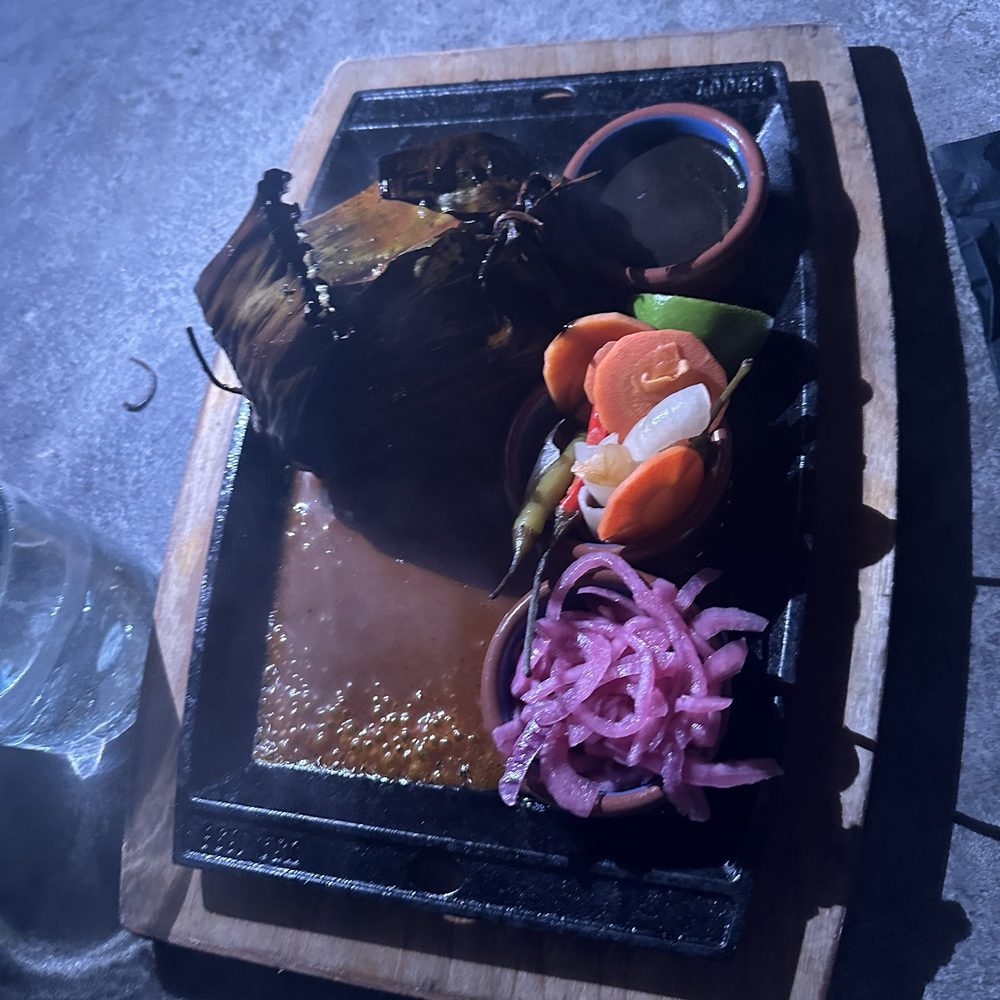 Ka'teen - Fantastic dish! Cochinita pibil wrapped in a banana leaf and served with pickled onions, carrots, onions and chilies. - Mexican Near Me - Los Angeles, California