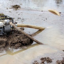 Drains R Us - Pumping out a water flood