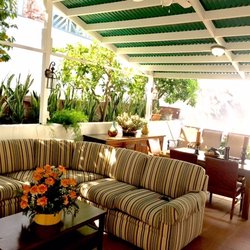 Ocean Breeze Care Home - Spacious open-air covered patio for dining and TV viewing