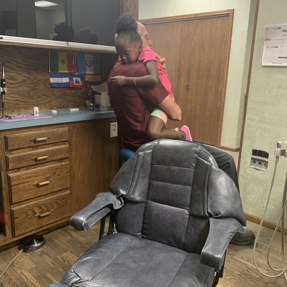 Fox Moor Dental Clinic - After he pulled her tooth he hugged her to tell her she did great. - General Dentistry Near Me - Aurora, Illinois