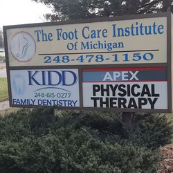 Office Sign. Often miss pulling into right parking lot.