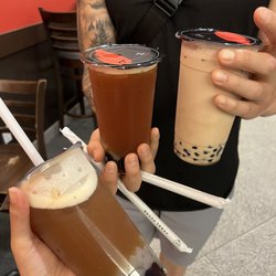 Pearl Fever Tea House - Lychee black teas with coconut jelly and pearls. One milk tea with pearls and grass jelly