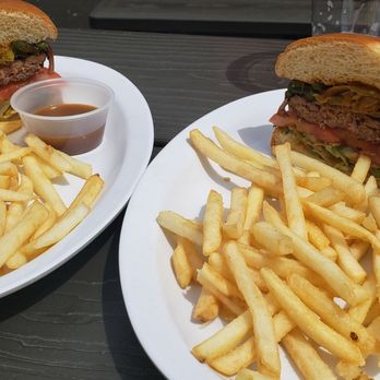 Mary's Bar & Grill - Perfectly Split Burger with Mary's Sauce on the side. - American Near Me - Longview, Washington Mary's Bar & Grill - Perfectly Split Burger with Mary's Sauce on the side. - American Near Me - Longview, Washington