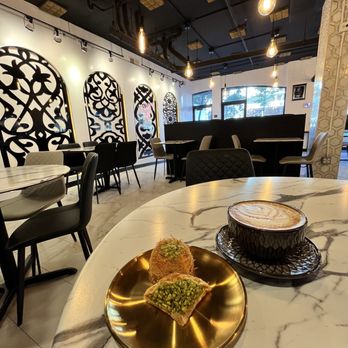 Heyma Yemeni Coffee - Two of the three kinds of baklava and the Heyma latte - Coffee & Tea Near Me - Berkeley, California Heyma Yemeni Coffee - Two of the three kinds of baklava and the Heyma latte - Coffee & Tea Near Me - Berkeley, California