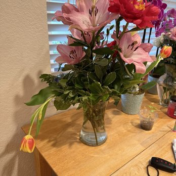 Modesto Exotic Flowers - Another side of the arrangement which has no flowers and only green And a lot of wilting - Florists Near Me - Modesto, California
