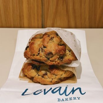 Levain Bakery - Chocolate Chip Walnut Cookie (top) Two Chip Chocolate Chip Cookie (bottom) - Bakeries Near Me - Venice, California