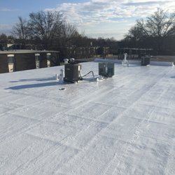 Stonebridge Roofing - Flat Roof Coatings. Add life to your flat roof with a Karnak Roof Silicone Coating.