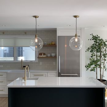 Mullan Enterprises - a kitchen with a large island - General Contractors Near Me Mullan Enterprises - a kitchen with a large island - General Contractors Near Me