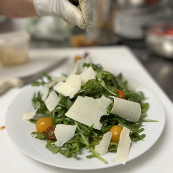 Baonecci Ristorante - a plate of salad with parmesan cheese - Italian Near Me - Frisco, Texas Baonecci Ristorante - a plate of salad with parmesan cheese - Italian Near Me - Frisco, Texas