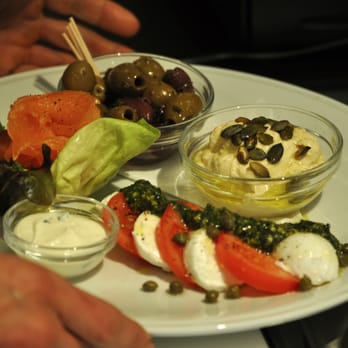 Abinish - Salmon, olives, horseradish sauce, pesto, mozzerella, tomatoes, hummus with pine nuts - Salad Near Me - Amsterdam, New Hampshire Abinish - Salmon, olives, horseradish sauce, pesto, mozzerella, tomatoes, hummus with pine nuts - Salad Near Me - Amsterdam, New Hampshire