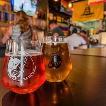 Launch Pad Brewery - two glasses of beer on a bar - Breweries Near Me - Aurora, Colorado Launch Pad Brewery - two glasses of beer on a bar - Breweries Near Me - Aurora, Colorado