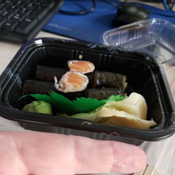 Fuji Hibachi Express - a hand holding a container of food - Japanese Near Me - Spring Hill, Florida Fuji Hibachi Express - a hand holding a container of food - Japanese Near Me - Spring Hill, Florida