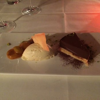 Bagatelle - Chocolate Tart w/ vanilla ice cream & poached mirabelles - French Near Me - Trier, RP Bagatelle - Chocolate Tart w/ vanilla ice cream & poached mirabelles - French Near Me - Trier, RP