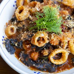 Trattoria Trullo - Mafaldine al Nero di Seppia- squid ink mafaldine, calamari, langoustine, and nduja tomato sauce