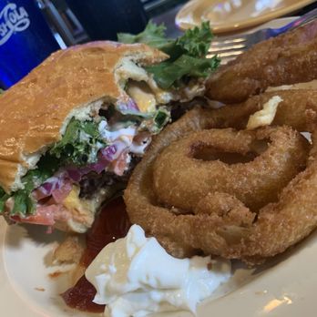 Purple Parrot Grill - The Hangover Burger, all dressed up and partially devoured. - Bars Near Me - Rehoboth Beach, Delaware Purple Parrot Grill - The Hangover Burger, all dressed up and partially devoured. - Bars Near Me - Rehoboth Beach, Delaware