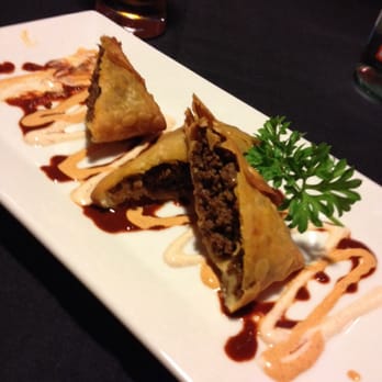 Maaza 29 - Before my husband snatched one off the plate- beef sambusa's. Ethiopian version of an empanadas. So yum! - Ethiopian Near Me - Gainesville, Virginia Maaza 29 - Before my husband snatched one off the plate- beef sambusa's. Ethiopian version of an empanadas. So yum! - Ethiopian Near Me - Gainesville, Virginia