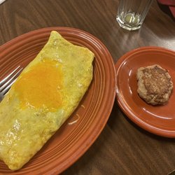 Waltz Creamery and Farm House Cafe - 3-egg fluffy omelet made with brown eggs. And sausage patty.