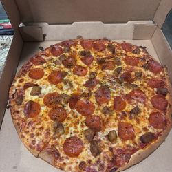 Pizza World - Pepperoni and Italian sausage thin crust. Perfection!