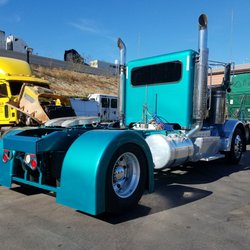 American Modified Auto Body Paint and Restoration - 2013 peterbilt painted frame and fiberglass rear fenders