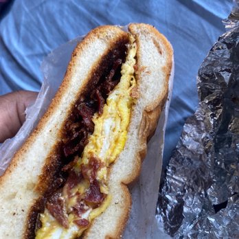 AZ Deli - A bacon Egg Sandwich with Beef Bacon, and Cheese lack Of ketchup. - Salad Near Me - Bronx, New York