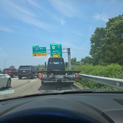 All Day & All Night Towing - Tow truck rescuing me from the side of the highway with NO breakdown lane. Highly recommend, you won't be disappointed!