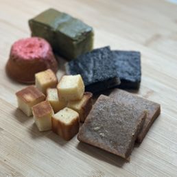 Sesame bar, earl grey bar, strawberry tart, matcha cake, and mochi bites