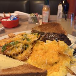 Bottomless Mimosas Ribeye Eggs with cheese, potatoes & toast Coconut Shrimp