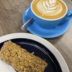 Spring - Cinnamon Date Oatbar and a flat white