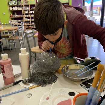 As You Wish Pottery - Blowing paint bubbles into pottery - Paint-Your-Own Pottery Near Me - Phoenix, Arizona