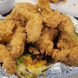 Texas size baked potato with crispy fried chicken Texas size baked potato with crispy fried chicken