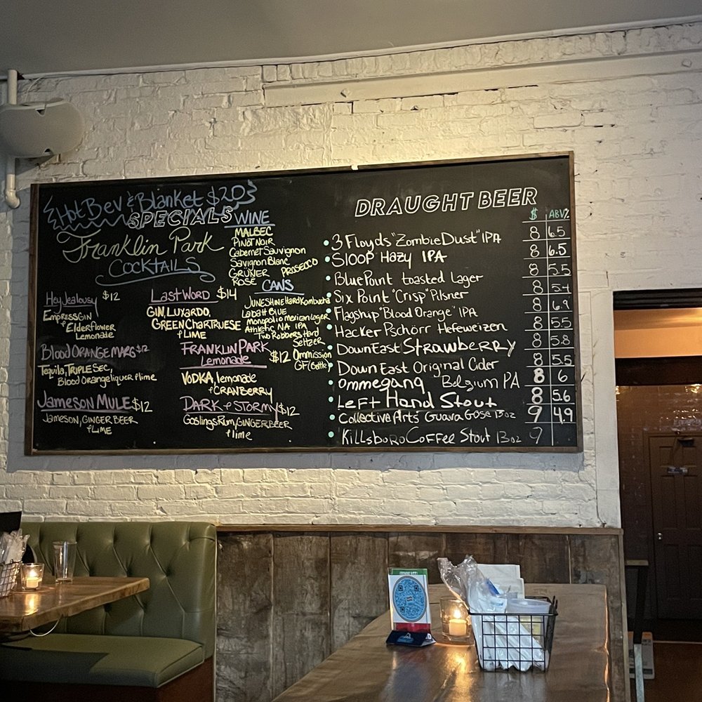 Franklin Park - a menu on the wall of a restaurant - Bars Near Me - Brooklyn, New York