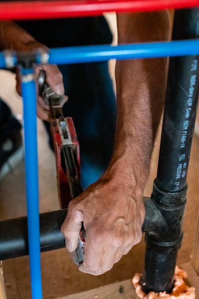 Slide of Three Sisters Plumbing