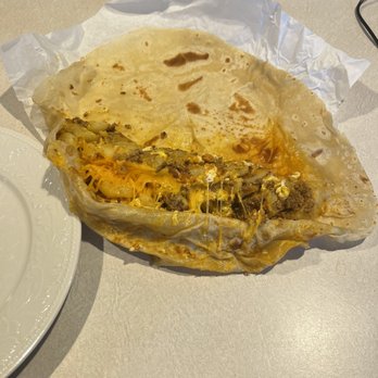 Los Betos - Chorizo burrito, I pulled apart to add sour cream and guacamole. - Mexican Near Me - Boise, Idaho Los Betos - Chorizo burrito, I pulled apart to add sour cream and guacamole. - Mexican Near Me - Boise, Idaho