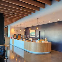 Need your latte fix? The made to order cafe counter is top notch! Also, nice selection of small pastries and some sweets too. Need your latte fix? The made to order cafe counter is top notch! Also, nice selection of small pastries and some sweets too.