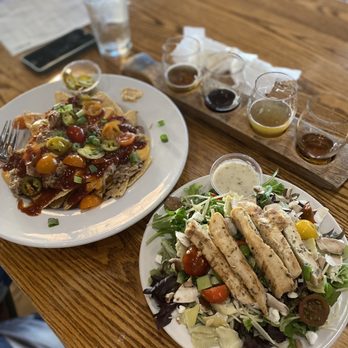 Stormcloud Brewing - Pork nachos and summer salad with chicken added. - Brewpubs Near Me - Frankfort, Michigan Stormcloud Brewing - Pork nachos and summer salad with chicken added. - Brewpubs Near Me - Frankfort, Michigan