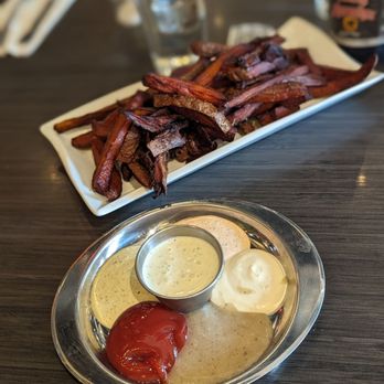 The Electric Cheetah - Delicious Sweet Potato Fries and assorted dip plate - New American Near Me - Grand Rapids, Michigan The Electric Cheetah - Delicious Sweet Potato Fries and assorted dip plate - New American Near Me - Grand Rapids, Michigan