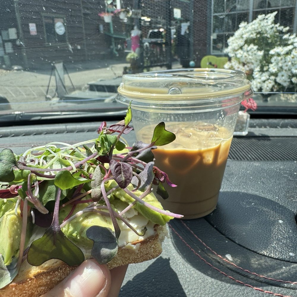 Avocado toast and iced pistachio hazelnut latte Avocado toast and iced pistachio hazelnut latte